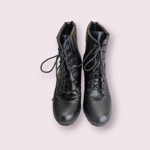 Black high heeled combat boot